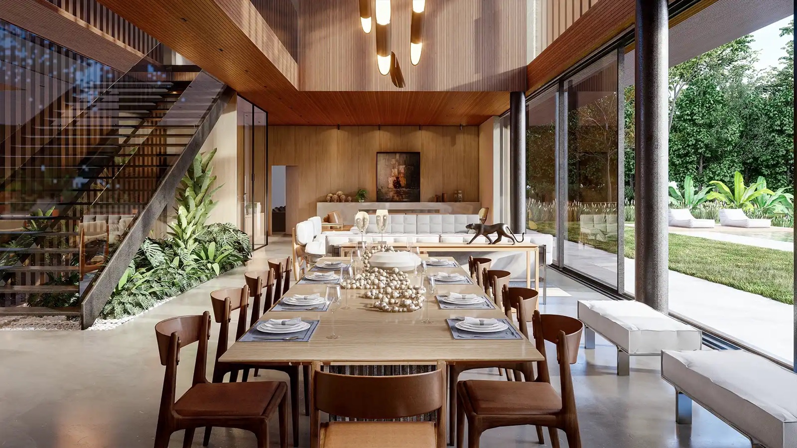 Sala de jantar integrada com pé-direito duplo e escada